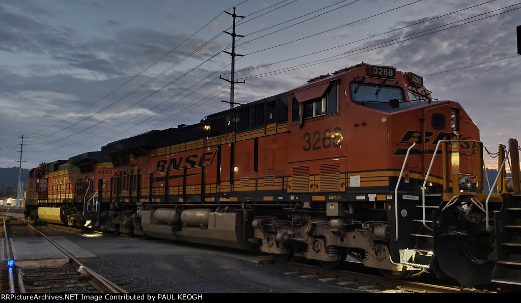 BNSF 3268 Number Locomotive on a Empty Grain Train waits to reverse into Her Empty Grain Cars at the Kelly Point Yard